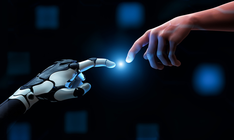 A robot hand and a human hand with extended pointer fingers reaching towards each other with a ball of light in the middle